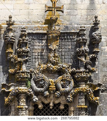 Detail Of The Delicate And Intricate Carvings Of The Upper Section Of The Manueline Window Of The Co