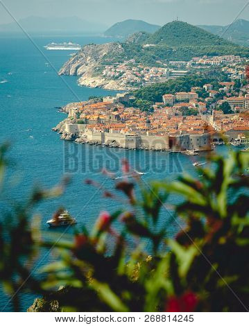 View Of Dubrovnik, The Bay And Boats Sailing