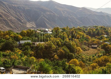 View Of The Yellowed Autumn Gardens, Of A Small Village Located High In The Mountains Geghama Ridge 