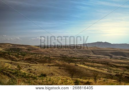 Blue Sky Over A Hilly Valley With Villages And Autumn Fields Located In The Mountains Geghama Ridge