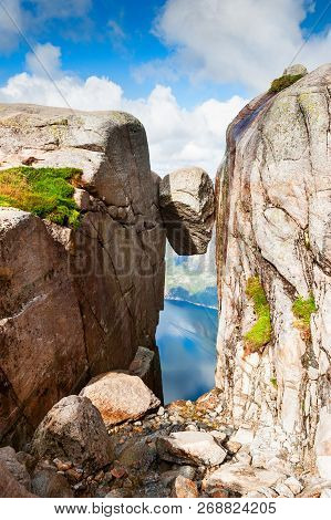 Kjeragbolten - Famous Landmark On Kjerag Mountain, Norway. Summer Landscape
