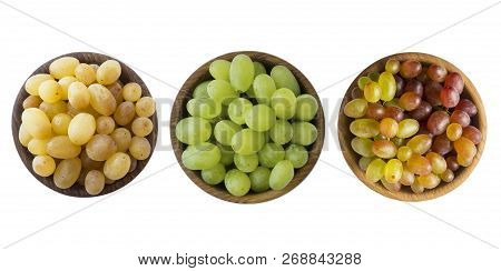 Green, Pink And Yellow Grapes Kishmish. Top View. Grapes In A Wooden Bowl Isolated On White Backgrou