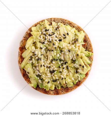 Whole Grain Bread Avocado Sandwich Seasoned With Black And White Sesame. Vegan Round Open Sandwich I
