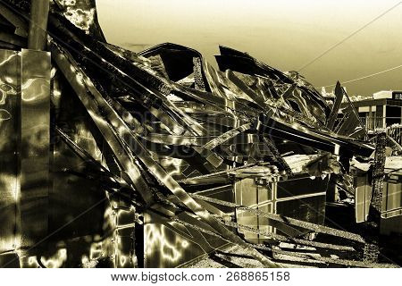 Damaged Industry Supermarket After Arson Fire With Burn Debris Of Twisted Metallic Wood Structure Af