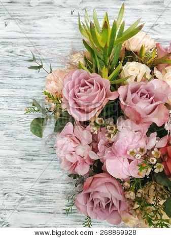 A Beautiful Floral Background: A Fresh Pastel Rose, Pink Hydrangea With Aerial Branches, And White C