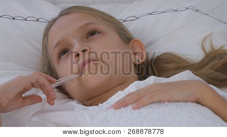 Sick Child in Hospital Bed, Ill Kid with Thermometer, Suffering Thoughtful Girl