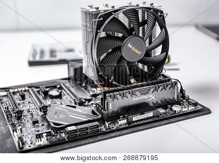 Uzhgorod, Ukraine - October 25, 2018: Installing Random Access Memory Kingston Ddr4 Hyperx Predator 