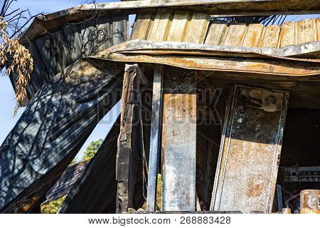 Damaged Industry Supermarket After Arson Fire With Burn Debris Of Twisted Metallic Wood Structure Af