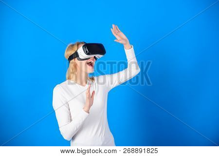 The Woman With Glasses Of Virtual Reality. Cheerful Smiling Woman Looking In Vr Glasses. Excited Smi