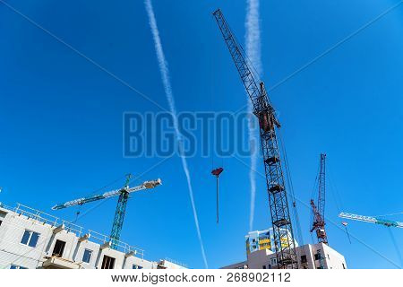 Modern Construction Site Of Building With Crane