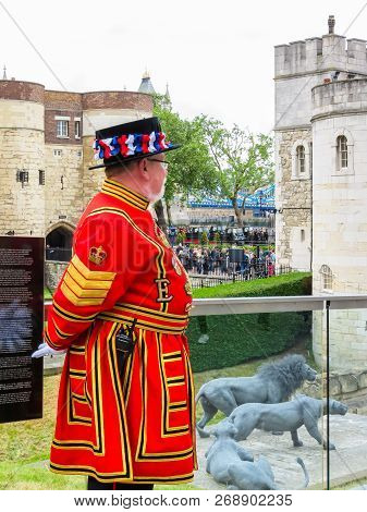 London, United Kingdom - June 10, 2013: Beefeater Near Walls Of The Tower Of London. Beefeaters Or Y