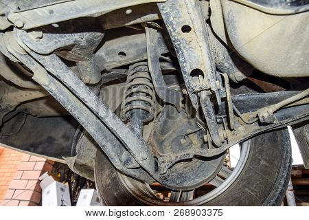Bottom View Of A Car. Forged Car For A Hundred. Car Repair. Car View From Below.