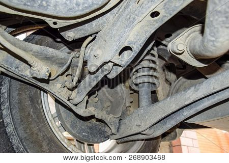 Bottom View Of A Car. Forged Car For A Hundred. Car Repair. Car View From Below.