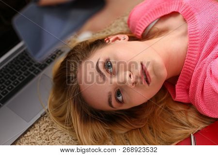 Young Beautiful Woman Have A Rest Lie On The Floor Hold Smartphone In Arms Nice Holiday Concept Voip