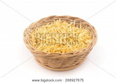Potato Sticks In A Basket Bowl. Batata Palha Isolated On White Background