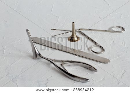 Rare Old Medical Steel Instruments For Examination And Treatment Of The Ear, Throat, Nose On White C