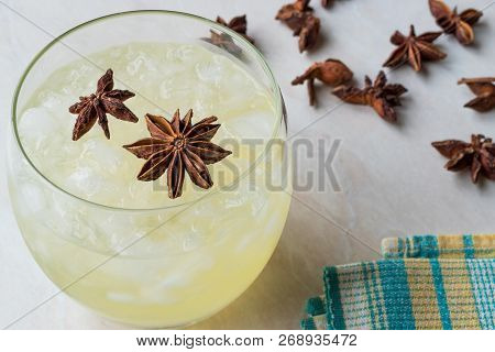 Cardamom Cocktail With Anise Star And Crushed Ice.