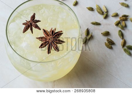 Cardamom Cocktail With Anise Star And Crushed Ice.