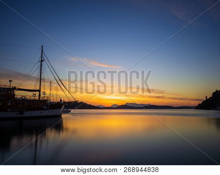Sailboat at Sunrise on the bay of Nidri in Lefkas island Greece