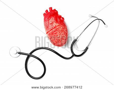 Stethoscope For Checking Pulse And Heart Model On White Background, Top View