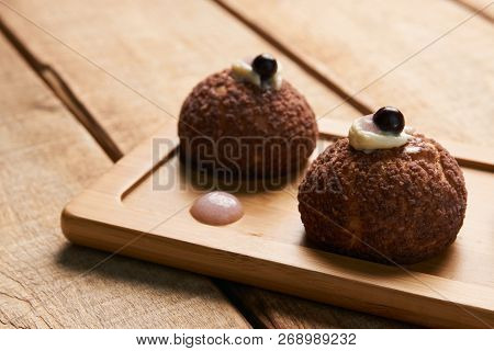 Cake Brioche Shu Cream Chantilly, Eclair. Sweet Breakfast Desser