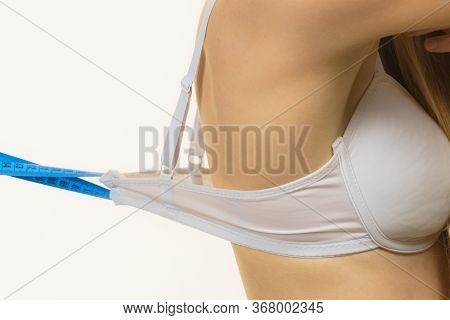 Woman Wearing Too Big Bra, Loose Band