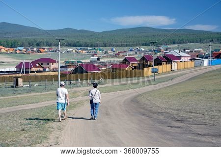 OLKHON ISLAND, 27 AUGUST, 2019: Tourists traveling on Olkhon Island, Baikal Lake, Siberia, Russia