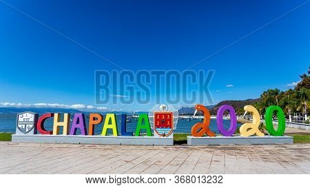 Chapala, Jalisco / Mexico, January 20th. 2020. Word In Bright Colors Of Chapala 2020, Boats And Moun