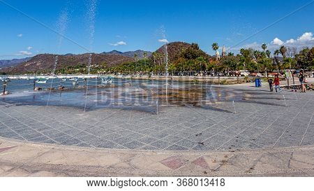 Chapala, Jalisco / Mexico, January 20th, 2020. Fountain Spraying The Ground With Water On The Promen