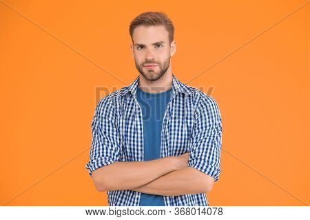 What Means Confidence For Men. Good Looking Stylish Guy Stand With Crossed Arms. Charismatic Fashion