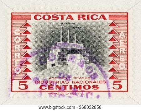 Seattle Washington - May 23, 2020:  1954 Costa Rica Stamp Featuring Vegetable Oils And Fats Refinery