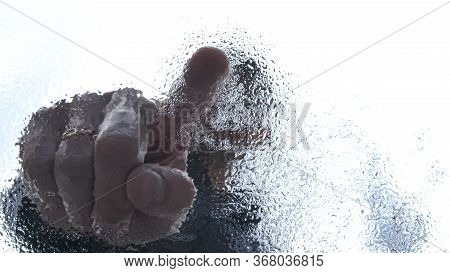 High Quality Close-up Of A Man Drawing Heart Shape On A Wet Glass With His Pointing Finger Wearing W
