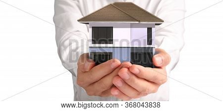 House Residential Structure In Hand.  Concept Of Investment Propert And Finance Investment Concep