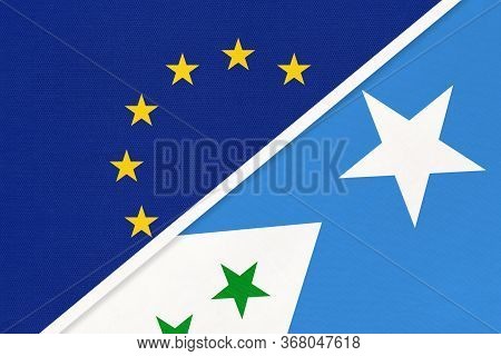 European Union Or Eu And Galmudug National Flag From Textile. Symbol Of The Council Of Europe Associ