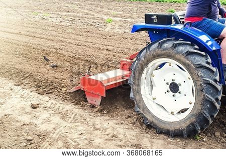 Tractor With Milling Machine Loosens, Grinds And Mixes Soil. Cultivation Technology Equipment. Loose