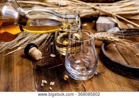 Speyside Scotch Whisky Tasting On Old Dark Wooden Vintage Table With Barley Grains Close Up