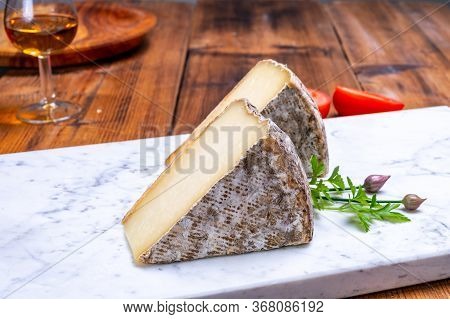 Cheese Tomme De Montagne Or Tomme De Savoie Made From Cow Milk In French Alps.