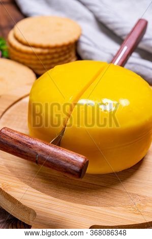 Dutch Baby Gouda Cheese In Yellow Wax
