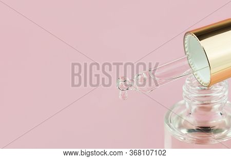 Bottle Of Hyaluronic Acid Serum Or Cosmetic Essential Oil