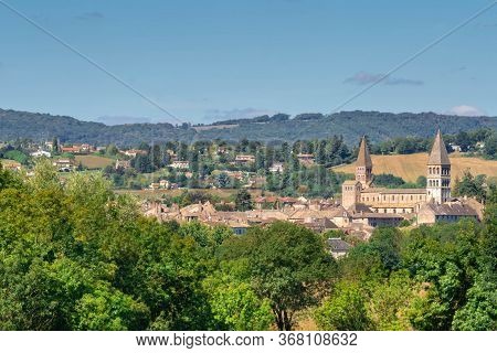 French Town Tournus In Summer Landscape. Panoramic View Of Old Town And Abbey Of Tournus In Region B