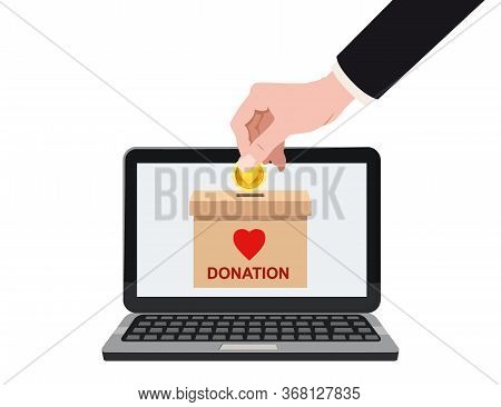 Donate Online Payments. Hand Insert Money Gold Coin In To The Donation Box On A Laptop Pc Display. C