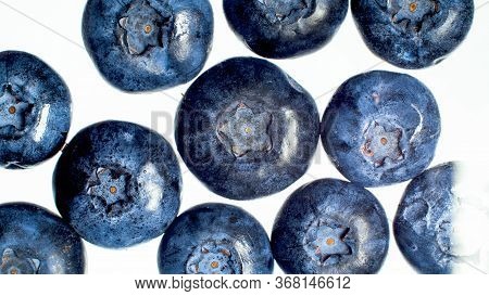 Closeup Image Of Ripe Blueberrries Or Currant On White Backgrund. Abstract Background Of Berries And