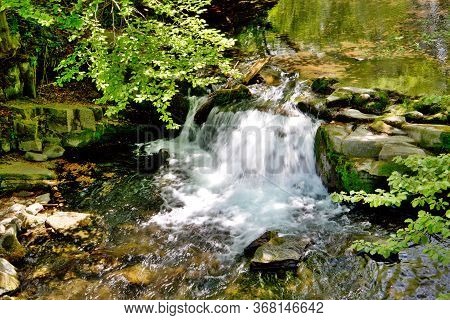 Weir On The Watercourse Of The River Mohelnice, Below Lysá Hora, A Forest Stream In The Village Of K