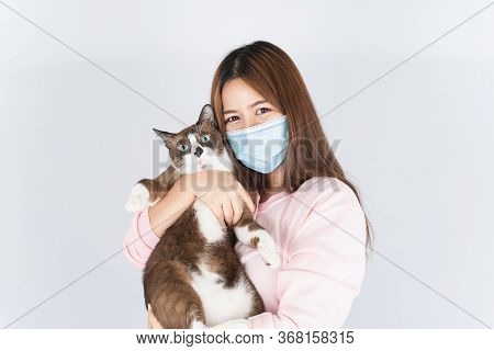 Asian Beautiful Happy Woman Wearing A Medical Protection Face Mask For Protect The Coronavirus, Filt
