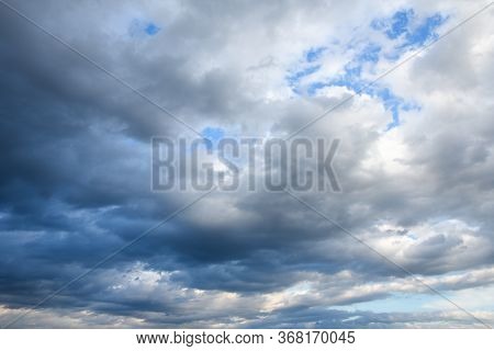 Stormy Sky With Storm Clouns On The Sunset With Beautiful Sun