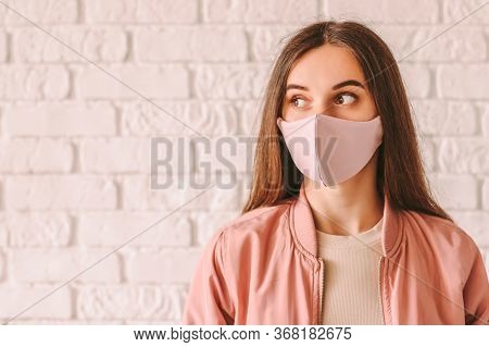 Portrait Happy Young Woman In Trendy Medical Face Mask Look At Copy Space. Beautiful Stylish Hipster