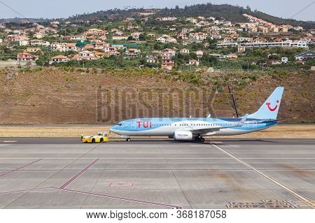 Madeira, Portugal - August 3, 2018: The Plane On The Runway Of Madeira Airport.