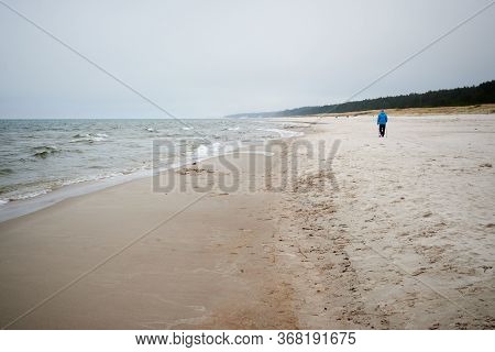 Sandy Beach And Baltic Sea On A Cloudy And Foggy Day. Poland