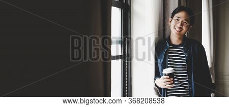 Panoramic Image, Portrait Asian Man Business Startup. He Is Young Entrepreneur Generation Y And Rela