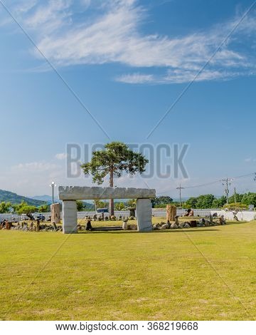 Gimcheon, South Korea; May 24, 2020: Landscape Of Rock Garden Under Blue Cloudy Sky With Stone Gate 